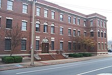 A three-story, red brick building in Arkansas. The Rose Law Firm is located inside this building. Clinton worked at Rose Law Firm for fifteen years.